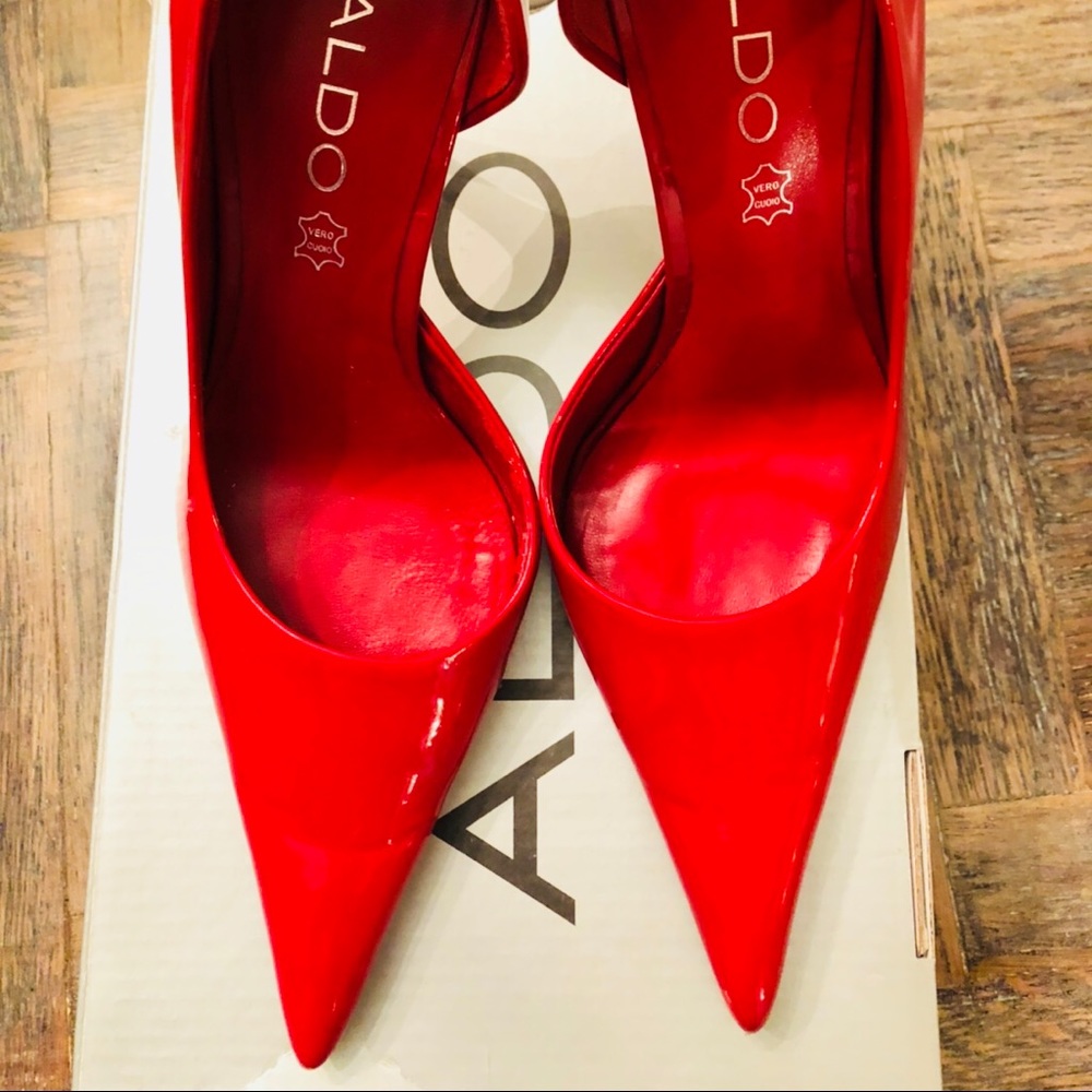Aldo Red patent leather pumps.